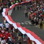 Kirab Merah Putih, Mahasiswa Teguhkan Semangat Persatuan dan Indonesia Damai